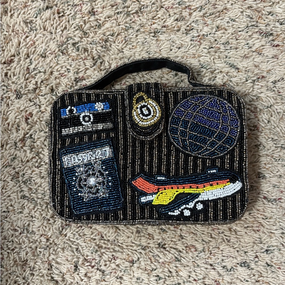 Viral ‘Made in India’ Beaded Travel-Themed Clutch with silver chain